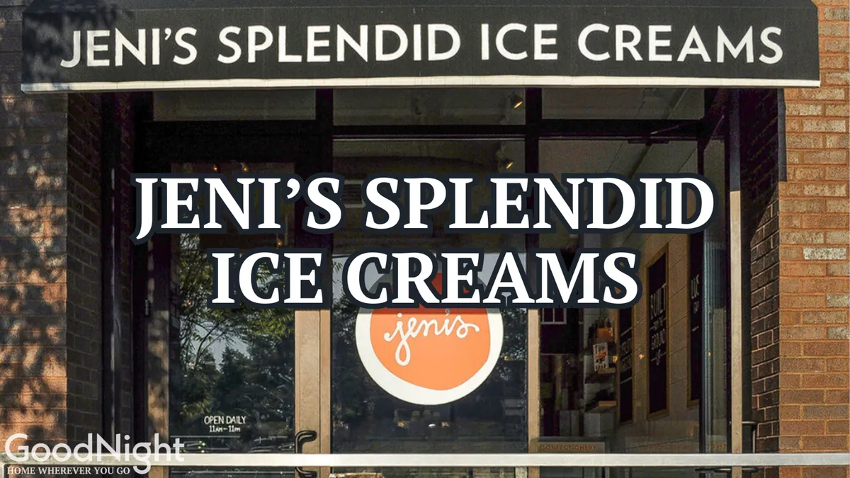 The cheerful storefront of Jeni’s Splendid Ice Creams, with bright signage and inviting glass doors, hints at the playful, sweet experiences inside. The view includes part of the interior where people can enjoy their treats, evoking a sense of community and delight.